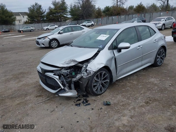 2019 Toyota Corolla Hatchback SE with VIN JTNK4RBE6K3064695, listed as a IAAI auction lot 41296362 with 56,282 mi miles. Bid and sale history available at carsss.com. Image 2.