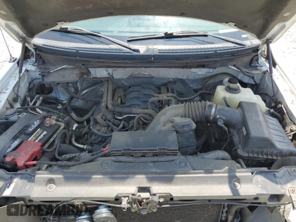 2012 Ford F-150 XL with VIN 1FTNF1CF9CKD27242, listed as a Copart auction lot 62665505 with 202,023 mi miles and Salvage title. Bid and sale history available at DreamBid. Image 11.