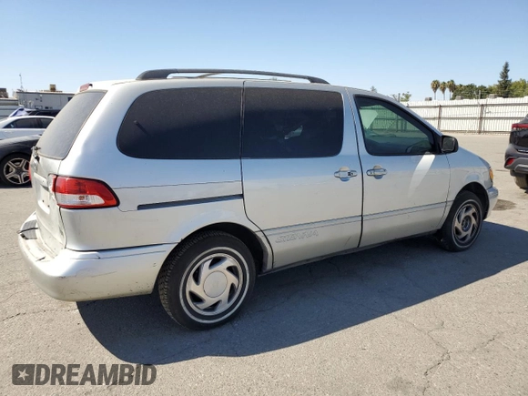2002 Toyota Sienna LE with VIN 4T3ZF13CX2U458385, listed as a Copart auction lot 69523254 with 187,836 mi miles and Salvage Title. Bid and sale history available at carsss.com. Image 3.