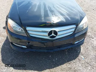 2011 Mercedes-Benz C-Class C 300 Sport with VIN WDDGF5EB7BF650020, listed as a IAAI auction lot 42009059 with 143,762 mi miles. Bid and sale history available at carsss.com. Image 6.