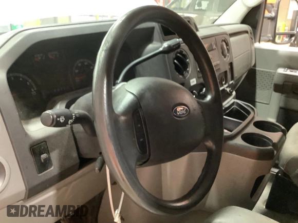 2013 Ford Econoline Cargo Commercial with VIN 1FTNE1EW9DDA61968, listed as a IAAI auction lot 42643038 with 121,719 mi miles and . Bid and sale history available at DreamBid. Image 5.