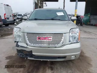 2014 GMC Yukon XL SLT with VIN 1GKS2KE71ER223496, listed as a IAAI auction lot 41419800 with 146,686 mi miles. Bid and sale history available at carsss.com. Image 12.
