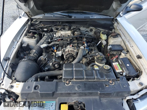 2000 Ford Mustang GT z VIN 1FAFP42X8YF309852, wystawiony jako Copart lot #57959605 z przebiegiem 251 001 mil mil oraz Szkoda całkowita • Salvage title. Historia ofert i sprzedaży dostępna na DreamBid. Obrazek 11.