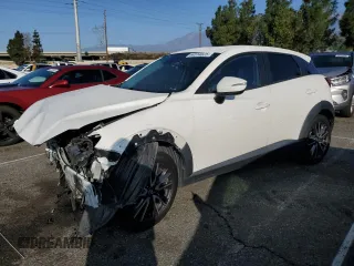 2018 Mazda CX-3 Touring with VIN JM1DKDC77J0318422, listed as a Copart auction lot 44514825 with 54,846 mi miles and Salvage Title. Bid and sale history available at carsss.com. Image 1.