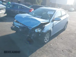 2012 Hyundai Accent GLS z VIN KMHCT4AEXCU231860, wystawiony jako IAAI lot #42138577 z przebiegiem 180 265 mil mil oraz . Historia ofert i sprzedaży dostępna na DreamBid. Obrazek 2.
