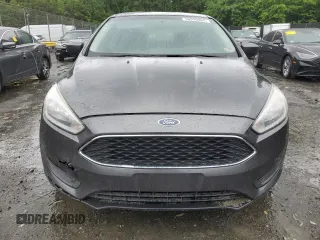 2018 Ford Focus SE z VIN 1FADP3F21JL285417, wystawiony jako Copart lot #56936965 z przebiegiem Nie podano mil oraz Czysty tytuł • Clean title. Historia ofert i sprzedaży dostępna na DreamBid. Obrazek 5.