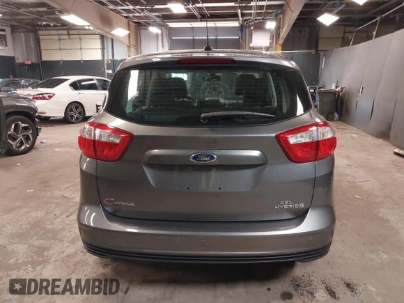 2013 Ford C-Max SEL z VIN 1FADP5BU9DL531704, wystawiony jako IAAI lot #42228841 z przebiegiem 91 808 mil mil oraz . Historia ofert i sprzedaży dostępna na DreamBid. Obrazek 16.