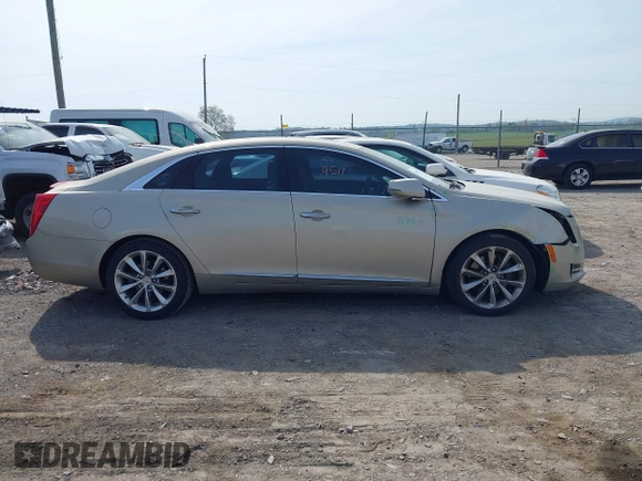 2013 Cadillac XTS Premium z VIN 2G61S5S35D9143656, wystawiony jako IAAI lot #42099511 z przebiegiem 207 055 mil mil oraz . Historia ofert i sprzedaży dostępna na DreamBid. Obrazek 13.