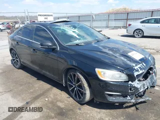 2016 Volvo S60 T5 Drive-E Premier z VIN YV126MFK5G1398229, wystawiony jako IAAI lot #42039229 z przebiegiem 99 604 mil mil oraz . Historia ofert i sprzedaży dostępna na DreamBid. Obrazek 1.