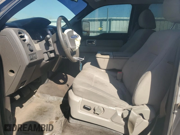 2010 Ford F-150 XL with VIN 1FTEW1C82AFD04120, listed as a Copart auction lot 48870955 with 209,719 mi miles and Salvage Title. Bid and sale history available at carsss.com. Image 7.