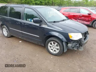2011 Chrysler Town & Country Touring with VIN 2A4RR5DG7BR641411, listed as a IAAI auction lot 42090973 with 158,298 mi miles and . Bid and sale history available at DreamBid. Image 1.