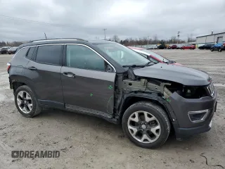 2018 Jeep Compass Limited with VIN 3C4NJDCB2JT373049, listed as a Copart auction lot 52282865 with 95,802 mi miles and Salvage Title. Bid and sale history available at DreamBid. Image 4.