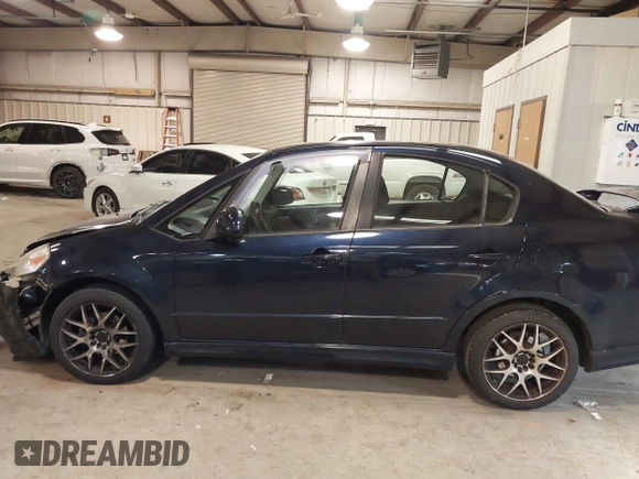 2008 Suzuki SX4 Convenience Pkg with VIN JS2YC415285110418, listed as a IAAI auction lot 41409562 with 147,175 mi miles. Bid and sale history available at carsss.com. Image 13.