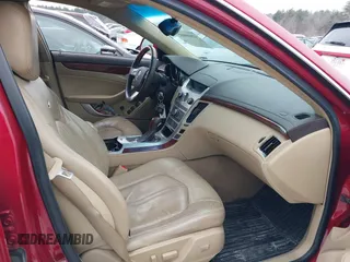 2010 Cadillac CTS with VIN 1G6DE8EG8A0130569, listed as a IAAI auction lot 41609081 with 113,174 mi miles and . Bid and sale history available at DreamBid. Image 5.