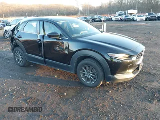2021 Mazda CX-30 2.5 S with VIN 3MVDMAALXMM213642, listed as a IAAI auction lot 41010906 with 105,280 mi miles. Bid and sale history available at carsss.com. Image 1.