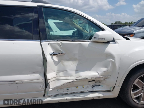 2012 GMC Acadia Denali with VIN 1GKKVTEDXCJ210342, listed as a IAAI auction lot 42549900 with 241,440 mi miles and . Bid and sale history available at DreamBid. Image 6.