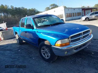 2001 Dodge Dakota Sport with VIN 1B7GL2AN21S143095, listed as a IAAI auction lot 41481027 with 253,540 mi miles. Bid and sale history available at carsss.com. Image 1.
