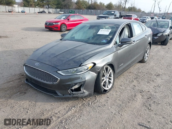 2019 Ford Fusion Hybrid Titanium with VIN 3FA6P0RU9KR158129, listed as a IAAI auction lot 41717104 with 37,736 mi miles. Bid and sale history available at carsss.com. Image 2.