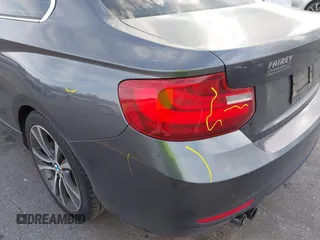 2015 BMW 2 Series 228i with VIN WBA1F5C59FV257447, listed as a IAAI auction lot 41706206 with 119,086 mi miles. Bid and sale history available at carsss.com. Image 20.