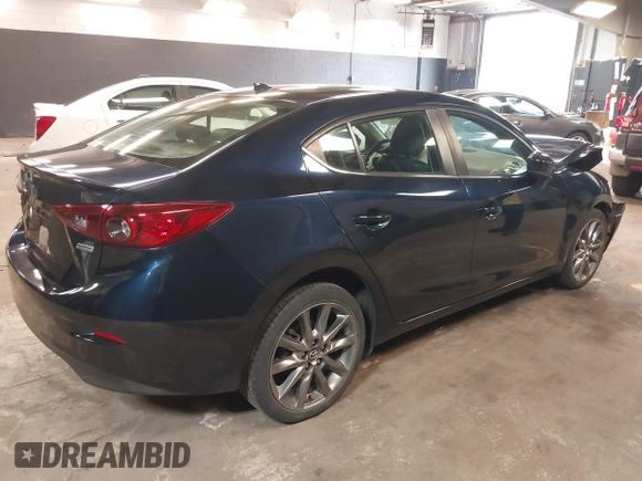 2018 Mazda 3 Touring with VIN 3MZBN1V30JM252166, listed as a IAAI auction lot 41828745 with 32,719 mi miles. Bid and sale history available at carsss.com. Image 4.