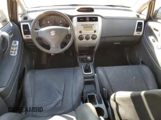 2006 Suzuki Aerio Premium z VIN JS2RC62HX65351200, wystawiony jako Copart lot #88077405 z przebiegiem 165 431 mil mil oraz Szkoda całkowita • Salvage title. Historia ofert i sprzedaży dostępna na DreamBid. Obrazek 8.