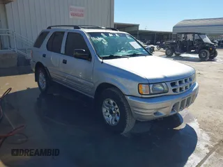 2002 Isuzu Rodeo S with VIN 4S2CK58WX24321556, listed as a IAAI auction lot 41405981 with 172,590 mi miles. Bid and sale history available at carsss.com. Image 1.