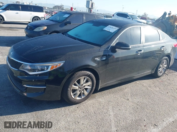 2017 Kia Optima LX with VIN 5XXGT4L30HG152700, listed as a IAAI auction lot 41826259 with 143,438 mi miles. Bid and sale history available at carsss.com. Image 17.