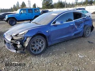 2020 Tesla Model 3 Standard Range Plus z VIN 5YJ3E1EA9LF706668, wystawiony jako Copart lot #47761765 z przebiegiem 85 448 mil mil oraz Szkoda całkowita • Salvage title. Historia ofert i sprzedaży dostępna na DreamBid. Obrazek 1.