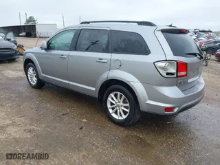 2015 Dodge Journey SXT with VIN 3C4PDCBG9FT722934, listed as a IAAI auction lot 41915676 with 144,796 mi miles. Bid and sale history available at carsss.com. Image 3.