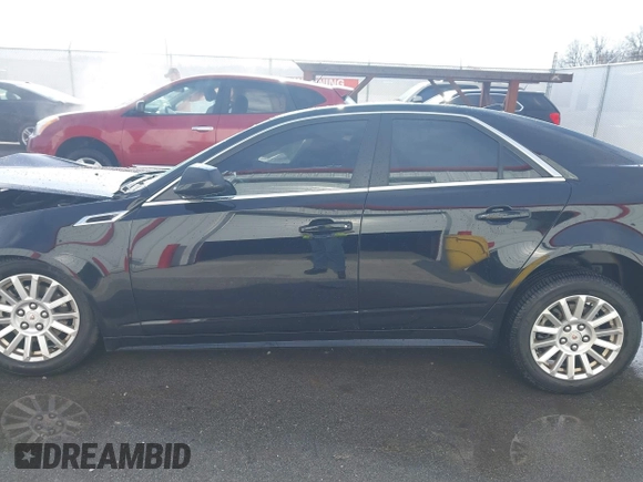2011 Cadillac CTS with VIN 1G6DC5EY7B0118590, listed as a IAAI auction lot 41003246 with Not provided miles and . Bid and sale history available at DreamBid. Image 15.