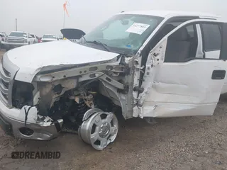 2014 Ford F-150 XL with VIN 1FTFX1EF3EKE72732, listed as a IAAI auction lot 41277885 with 153,712 mi miles. Bid and sale history available at carsss.com. Image 6.
