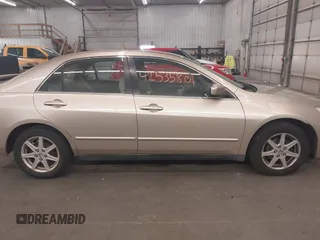 2004 Honda Accord LX with VIN 1HGCM66354A083707, listed as a IAAI auction lot 42535801 with 232,141 mi miles and . Bid and sale history available at DreamBid. Image 14.