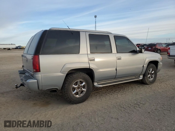 2000 GMC Denali z VIN 1GKEK63R9YR225073, wystawiony jako Copart lot #86819964 z przebiegiem 207 827 mil mil oraz Szkody całkowita. Historia ofert i sprzedaży dostępna na DreamBid. Obrazek 3.