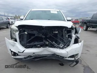 2019 GMC Yukon SLT with VIN 1GKS2BKC3KR160060, listed as a IAAI auction lot 42042122 with 124,733 mi miles. Bid and sale history available at carsss.com. Image 13.