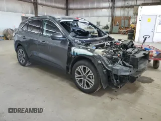 2021 Ford Escape SEL z VIN 1FMCU0H66MUB04206, wystawiony jako Copart lot #56638585 z przebiegiem Nie podano mil oraz Szkoda całkowita • Salvage title. Historia ofert i sprzedaży dostępna na DreamBid. Obrazek 4.
