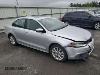 2011 Volkswagen Jetta SE with VIN 3VWDZ7AJ9BM320146, listed as a Copart auction lot 58521605 with 164,045 mi miles and Salvage title. Bid and sale history available at DreamBid. Image 4.