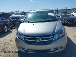 2016 Honda Odyssey Touring Elite with VIN 5FNRL5H96GB090653, listed as a IAAI auction lot 41720195 with 68,969 mi miles. Bid and sale history available at carsss.com. Image 12.