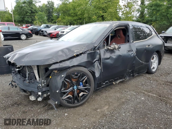 2023 BMW iX M60 with VIN WB533CF0XPCK81841, listed as a Copart auction lot 79402734 with 10,318 mi miles and Salvage Title. Bid and sale history available at carsss.com. Image 1.