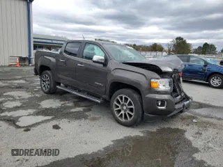 2020 GMC Canyon 4WD Denali with VIN 1GTG6EEN1L1134173, listed as a Copart auction lot 80079364 with 74,708 mi miles and Salvage Title. Bid and sale history available at carsss.com. Image 4.