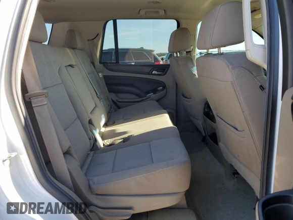 2016 Chevrolet Tahoe LS with VIN 1GNSCAKCXGR458090, listed as a Copart auction lot 86504394 with 166,558 mi miles and Salvage title. Bid and sale history available at DreamBid. Image 11.