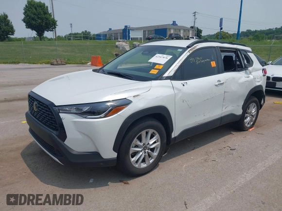 2023 Toyota Corolla Cross LE with VIN 7MUCAABG5PV070262, listed as a IAAI auction lot 42347876 with 24,449 mi miles and . Bid and sale history available at DreamBid. Image 2.