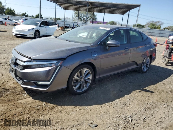 2019 Honda Clarity Plug-In Hybrid Touring with VIN JHMZC5F31KC003180, listed as a Copart auction lot 56952284 with 57,249 mi miles and Salvage Title. Bid and sale history available at carsss.com. Image 1.