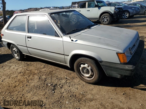 1986 Toyota Tercel z VIN JT2AL31G5G0429131, wystawiony jako Copart lot #79204554 z przebiegiem 124 477 mil mil oraz Szkoda całkowita • Salvage title. Historia ofert i sprzedaży dostępna na DreamBid. Obrazek 4.