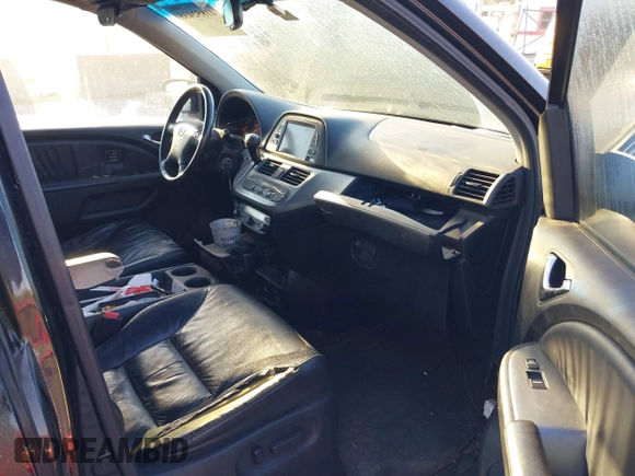 2010 Honda Odyssey Touring with VIN 5FNRL3H95AB031007, listed as a IAAI auction lot 41852435 with 207,919 mi miles. Bid and sale history available at carsss.com. Image 5.