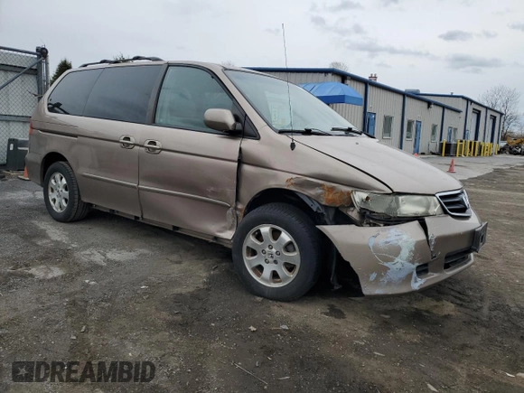 2003 Honda Odyssey EX-L z VIN 5FNRL18053B103431, wystawiony jako Copart lot #52580715 z przebiegiem Nie podano mil oraz Szkoda całkowita • Salvage title. Historia ofert i sprzedaży dostępna na DreamBid. Obrazek 4.