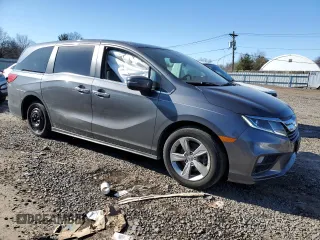 2019 Honda Odyssey EX-L with VIN 5FNRL6H74KB073086, listed as a Copart auction lot 46081795 with 61,323 mi miles and Salvage Title. Bid and sale history available at carsss.com. Image 4.