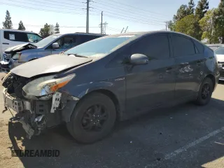 2015 Toyota Prius Four with VIN JTDKN3DU2F0479328, listed as a Copart auction lot 63482725 with 233,000 mi miles and Salvage title. Bid and sale history available at DreamBid. Image 1.