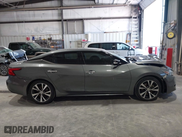 2018 Nissan Maxima SL z VIN 1N4AA6APXJC374220, wystawiony jako IAAI lot #42018130 z przebiegiem 119 776 mil mil oraz . Historia ofert i sprzedaży dostępna na DreamBid. Obrazek 13.