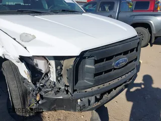 2017 Ford F-150 XL with VIN 1FTEX1C87HKD53036, listed as a IAAI auction lot 41815952 with 153,813 mi miles. Bid and sale history available at carsss.com. Image 18.