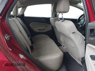2017 Ford Fiesta SE z VIN 3FADP4BJ9HM159284, wystawiony jako IAAI lot #41291003 z przebiegiem 79 668 mil mil oraz . Historia ofert i sprzedaży dostępna na DreamBid. Obrazek 8.